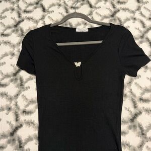 Black Ribbed V-Neck Top with Butterfly Accent